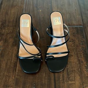 Black strappy Dolce Vita sandal.